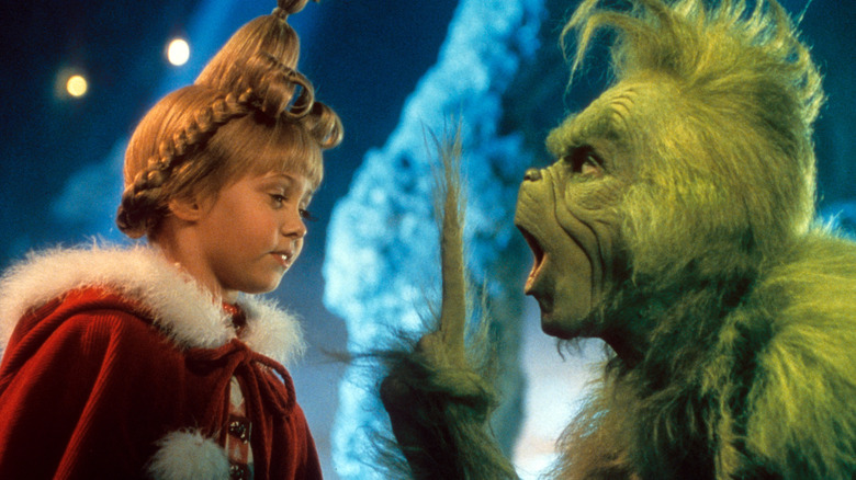 Taylor Momsen and Jim Carrey in the movie How the Grinch Stole Christmas