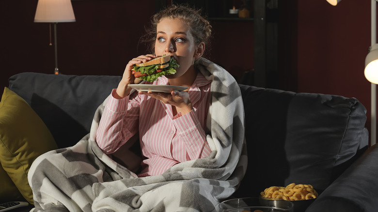 Woman eating late at night