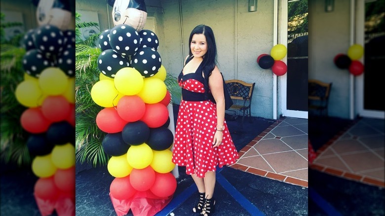 Social media image of a woman wearing a polka-dotted 50s-inspired dress