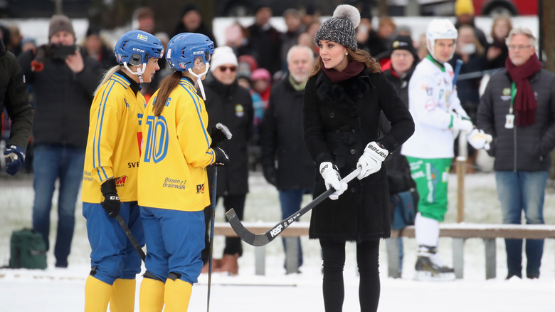 Kate Middleton plays hockey