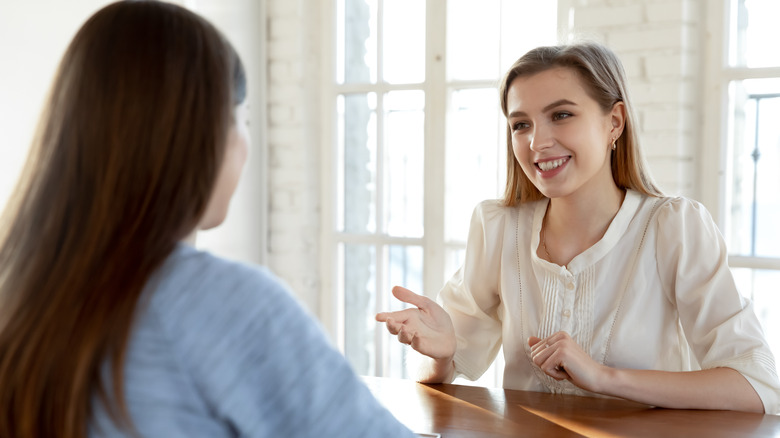 Two women talking