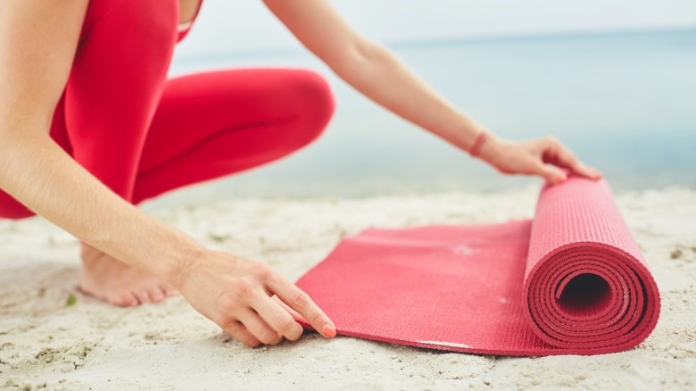 rolling up yoga mat