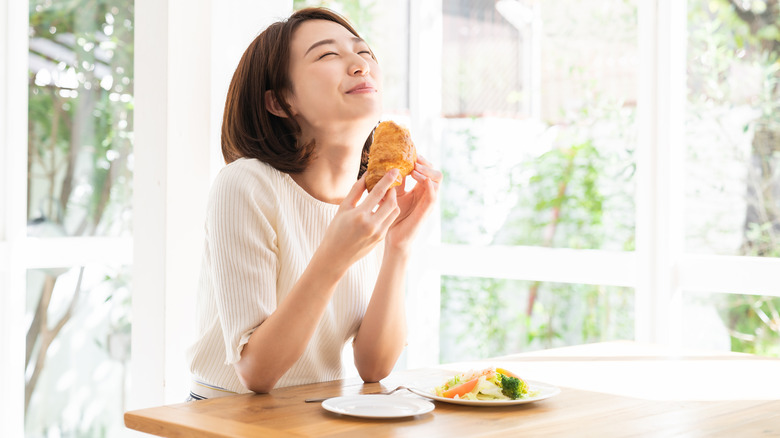 Woman enjoying a meal