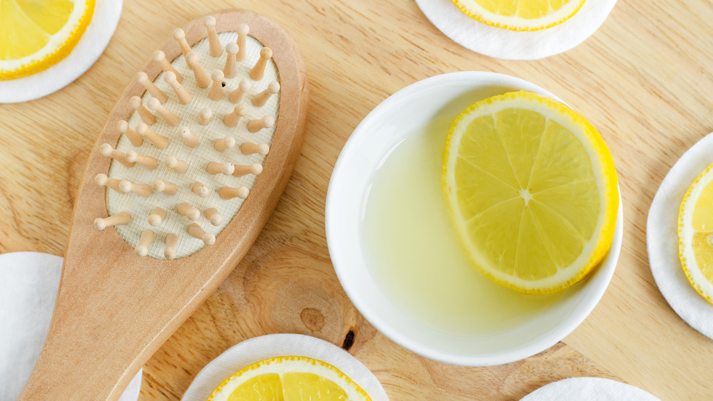 a hairbrush and lemon juice