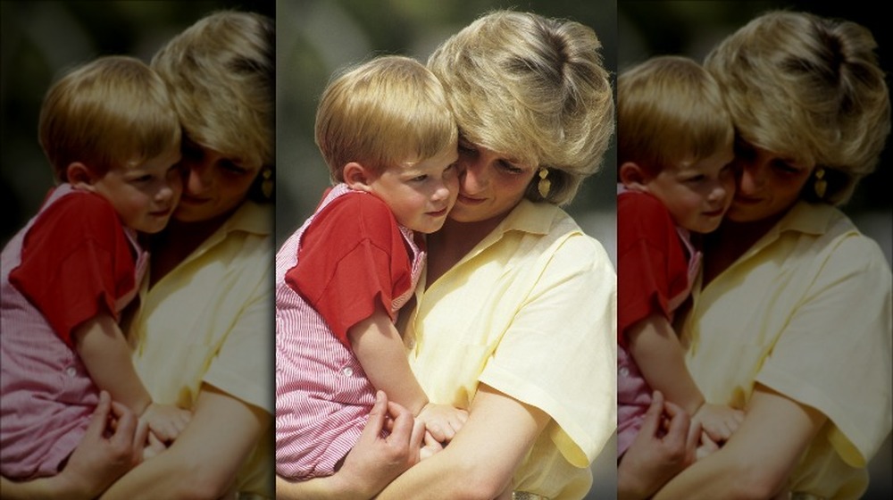 Princess Diana holding one of her sons