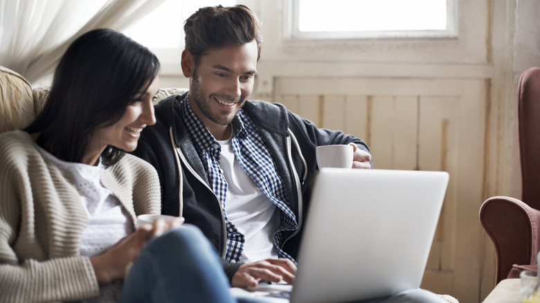 couple looking at laptop together