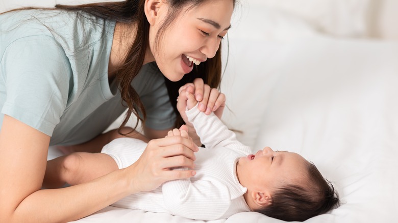 Mom and baby playing