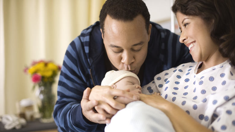 Couple with newborn baby