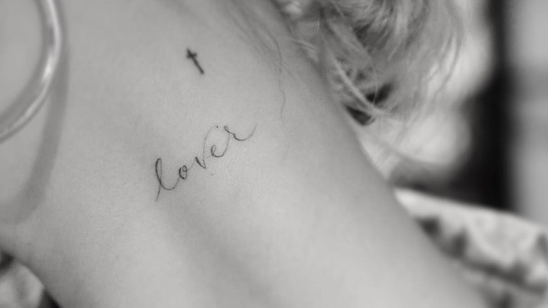 Hailey Baldwin's "Lover" neck tattoo