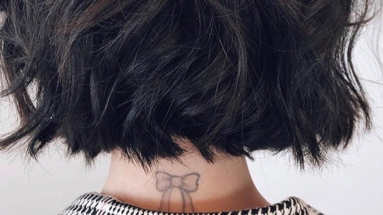 Lucy Hale's tattoo of a bow