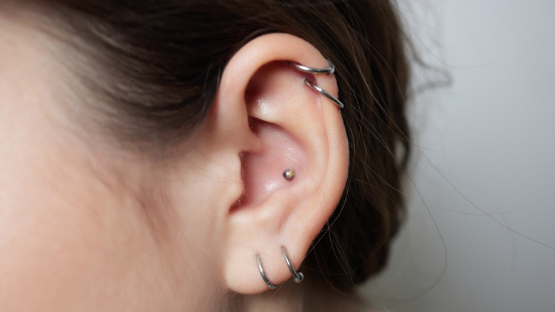 Woman with silver hoops