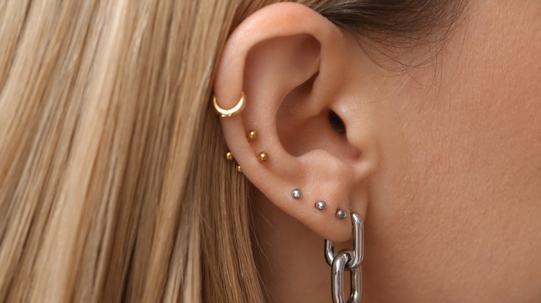 Ear with several piercings