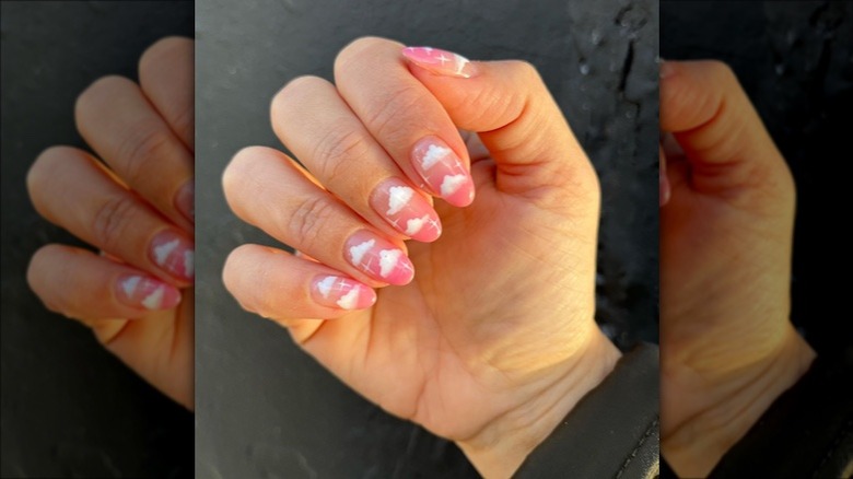 Pink ombré nails with fluffy white cloud design