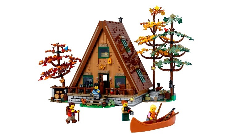 Brown Lego cabin with colorful accessories