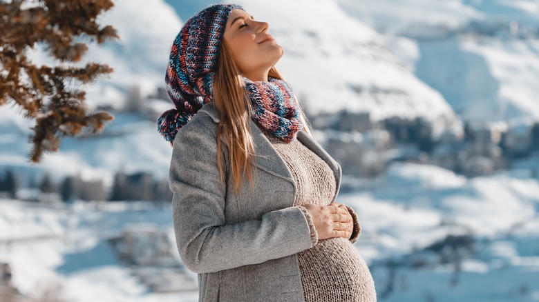 https://www.thelist.com/img/gallery/15-ways-to-survive-a-winter-pregnancy/get-your-wardrobe-winter-ready-1667842928.jpg