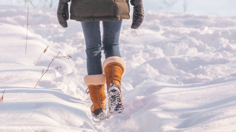 lady walking in snow