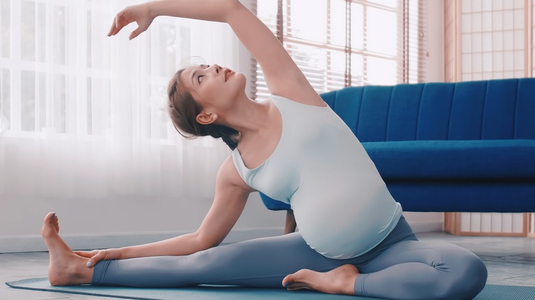 Pregnant woman doing yoga