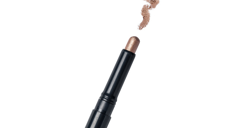 eyeshadow stick on white background 