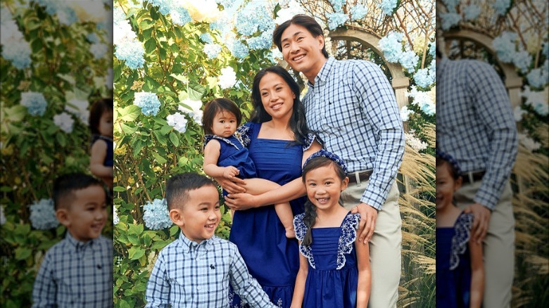 Family of five in matching blue outfits