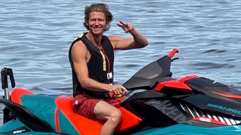 Andrew Francis smiling on a jetski 