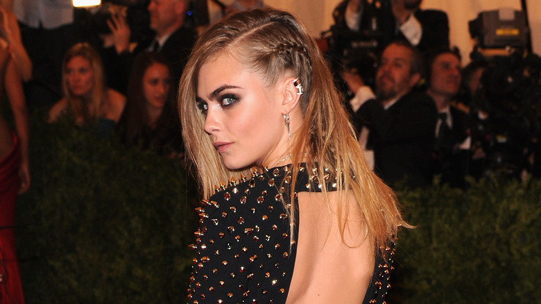 Cara Delevigne with faux undercut braid