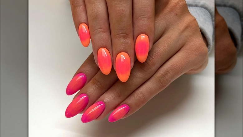 Sunset-colored aura nail design