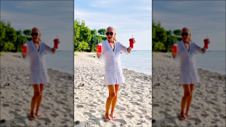 Kelly Ripa smiling on the beach 