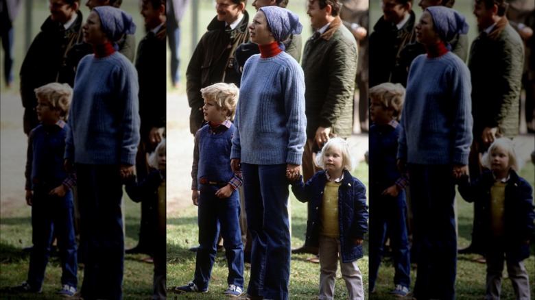 Princess Anne holding her children's hands