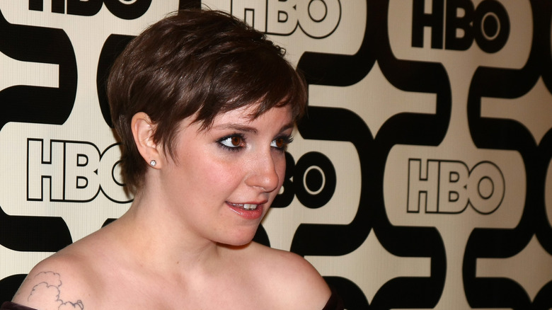 Lena Dunham, with a cropped haircut, arrives at the 2013 HBO Post Golden Globe Party