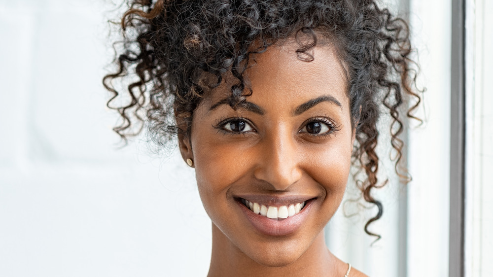 A woman wearing her natural hair