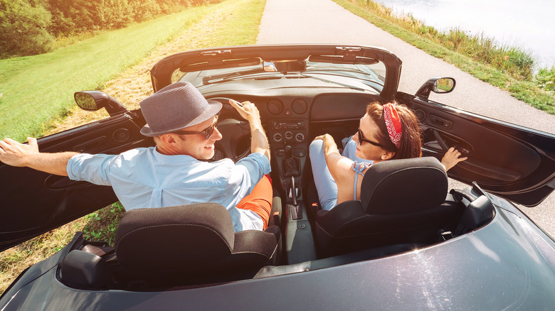 Couple in a convertible