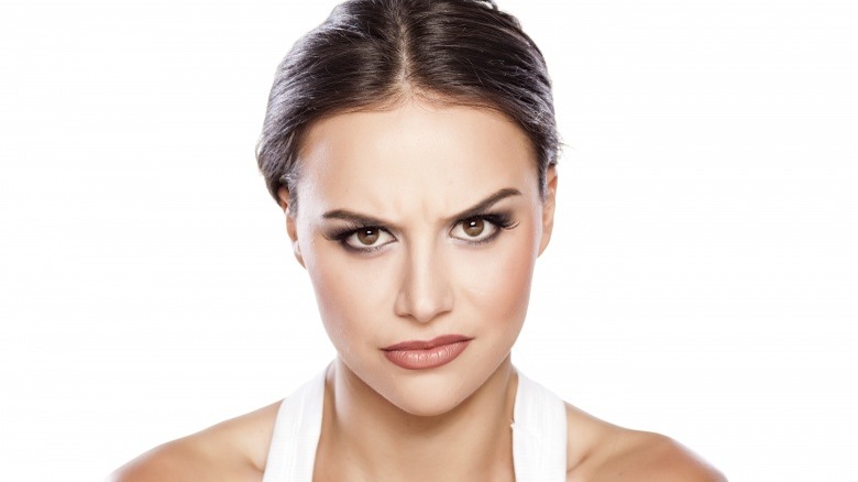 woman not smiling angry