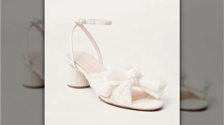 white heeled sandal with bow
