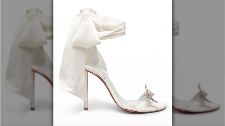 profile of white wedding heeled shoe