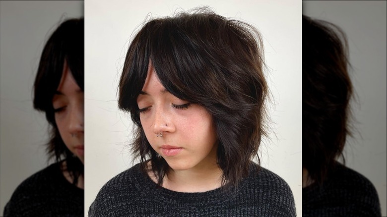 Woman with parted fringe lob