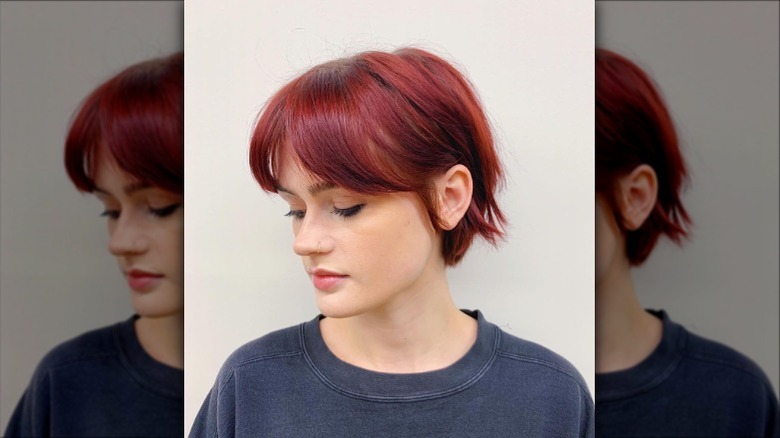 Woman with long pixie cut