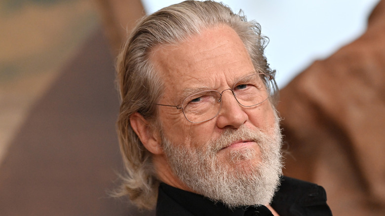 Jeff Bridges frowning in beard and glasses