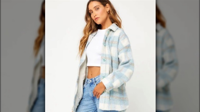 Woman wearing plaid jacket shacket