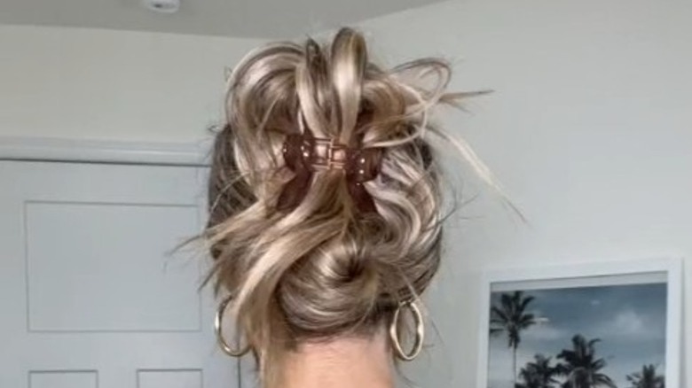 Messy hair in a claw clip