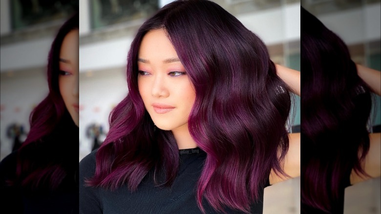 Dark locks with magenta highlights