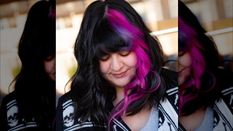 black hair with magenta streak