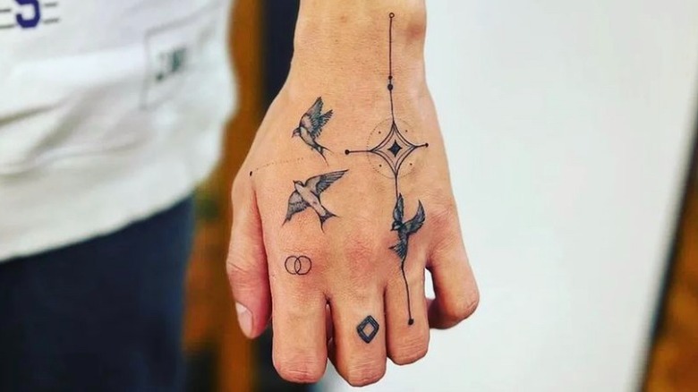 Hand with tattoos