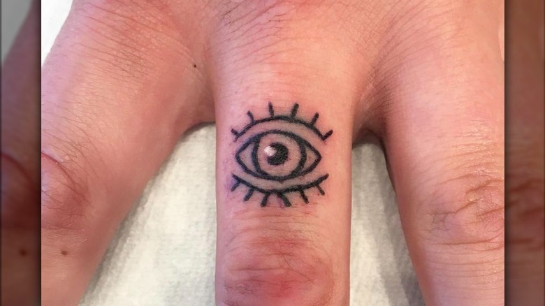 Eye tattoo on finger