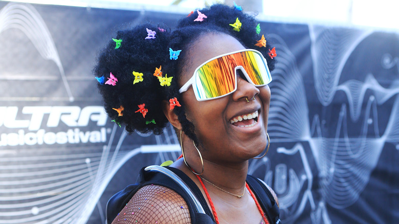 Woman wearing butterfly clips