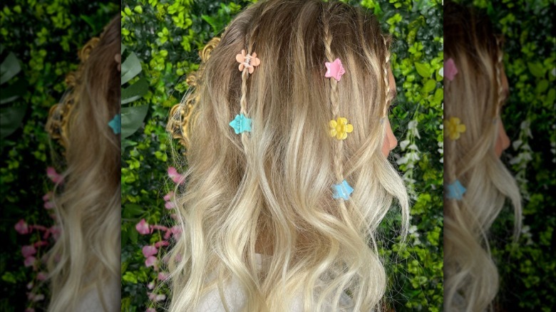 Woman with small braids and clips 