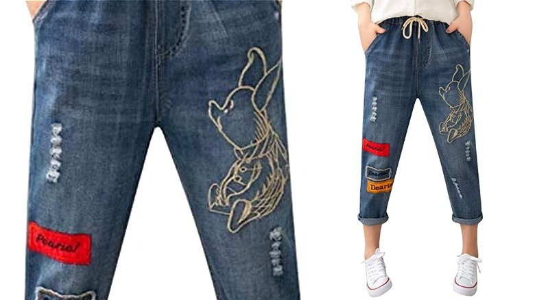 Dark jeans with a piglet theme