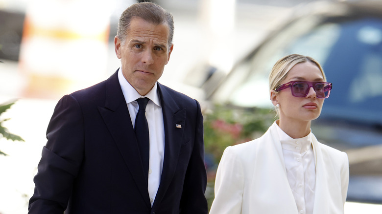 Hunter Biden and Melissa Cohen in suits with determined looks during his felony gun trial