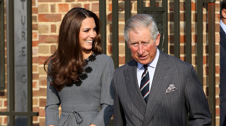 Kate and Charles walking together 