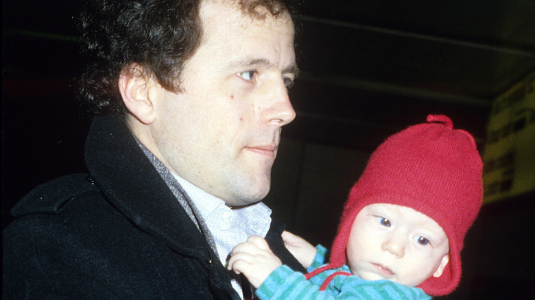 Don Gummer holding son Henry