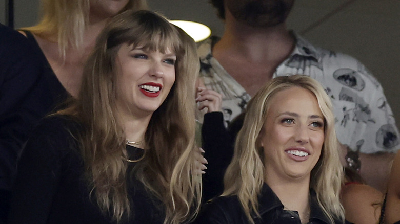 taylor swift and brittany mahomes smiling NFL game